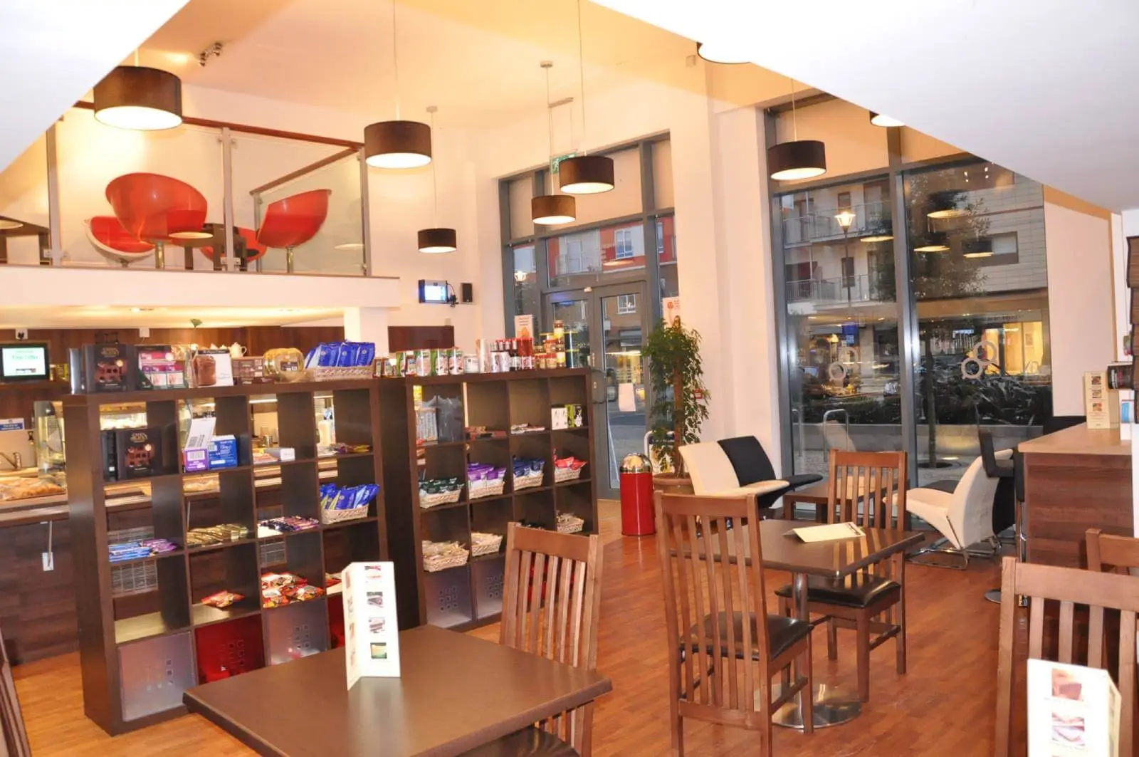 Vanilla Bazaar office space with designer furniture, laminated wood flooring, ceiling and glass partitions 12
