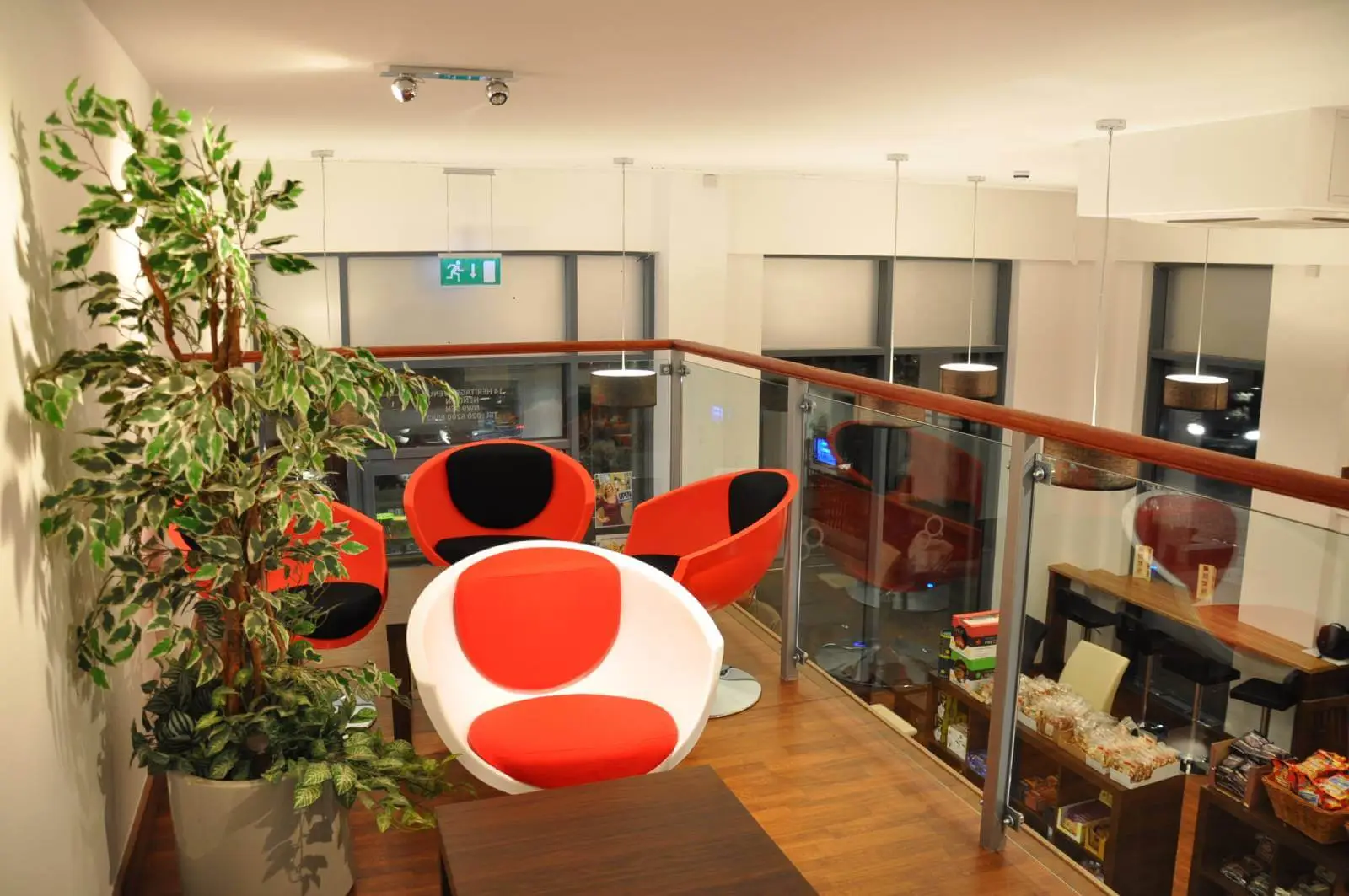 Vanilla Bazaar office space with designer furniture, laminated wood flooring, ceiling and glass partitions 16