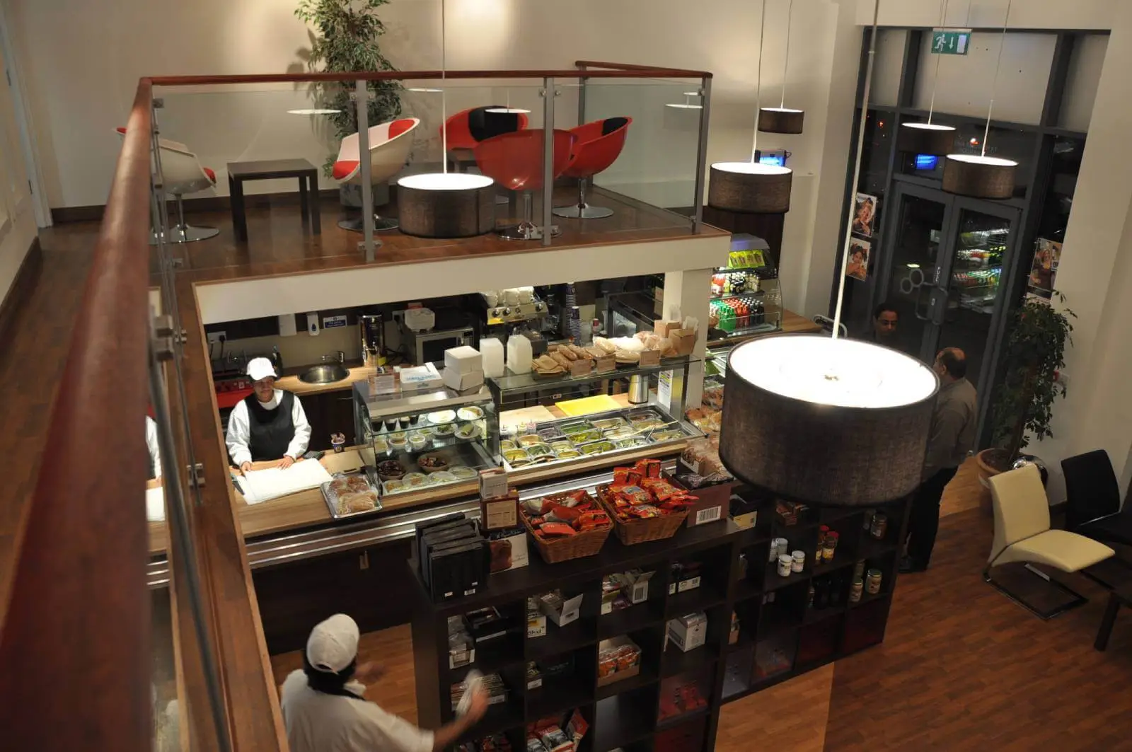 Vanilla Bazaar office space with designer furniture, laminated wood flooring, ceiling and glass partitions 17