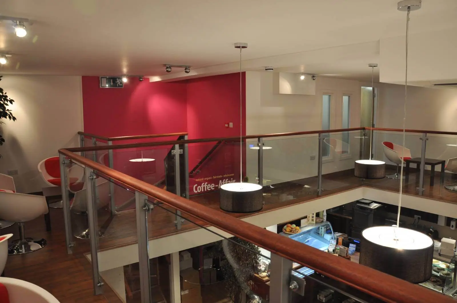 Vanilla Bazaar office space with designer furniture, laminated wood flooring, ceiling and glass partitions 18