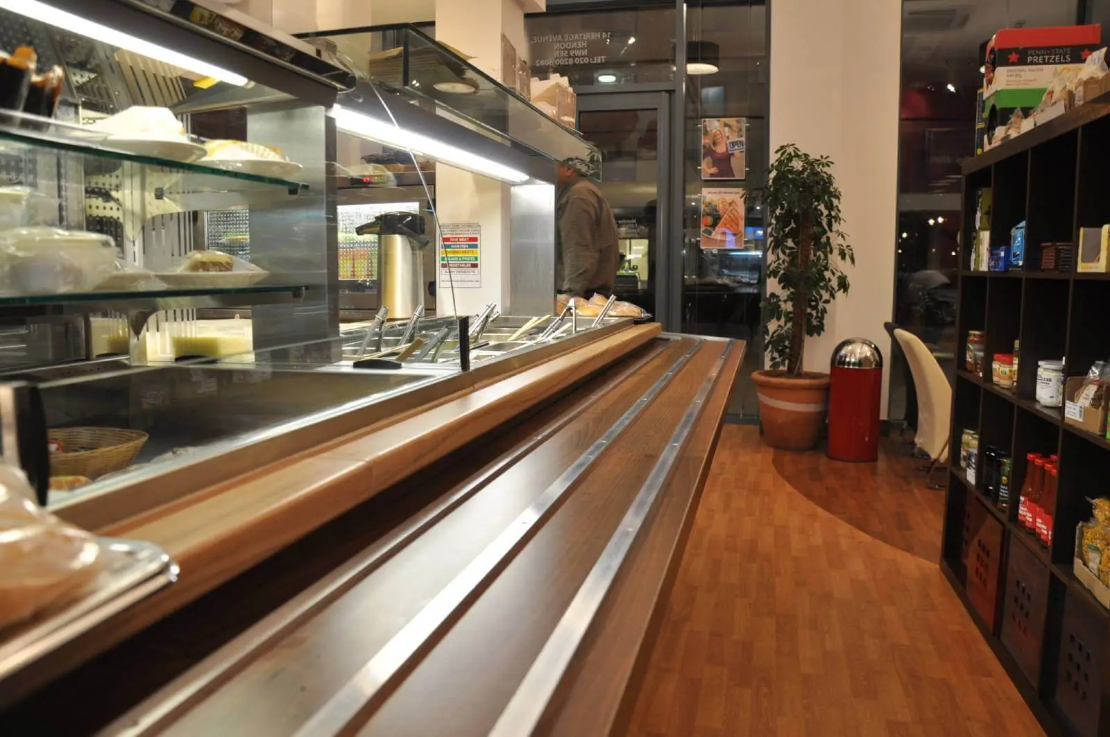 Vanilla Bazaar office space with designer furniture, laminated wood flooring, ceiling and glass partitions 19