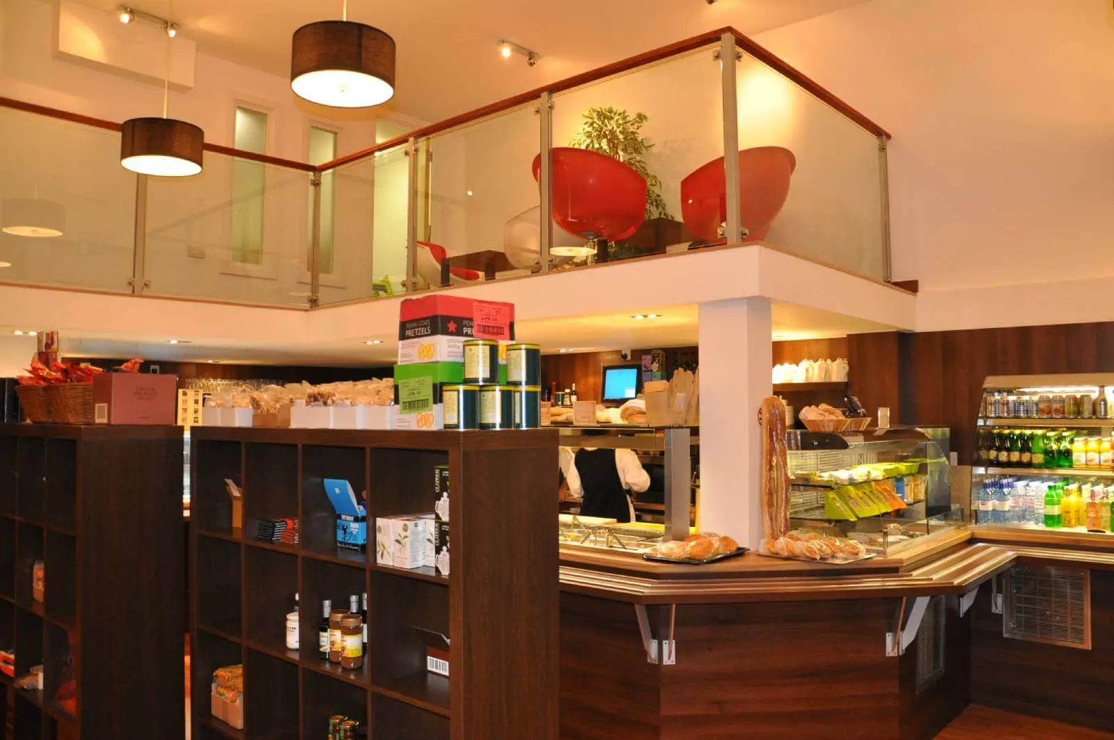 Vanilla Bazaar office space with designer furniture, laminated wood flooring, ceiling and glass partitions 2