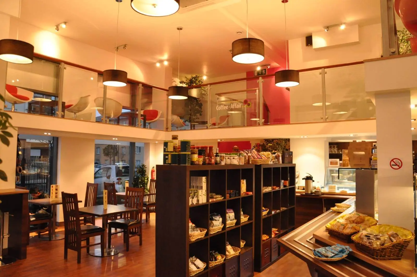 Vanilla Bazaar office space with designer furniture, laminated wood flooring, ceiling and glass partitions 5
