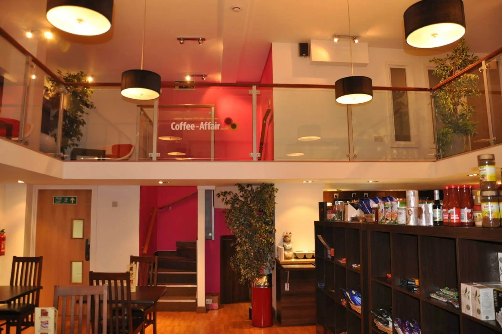 Vanilla Bazaar office space with designer furniture, laminated wood flooring, ceiling and glass partitions 6
