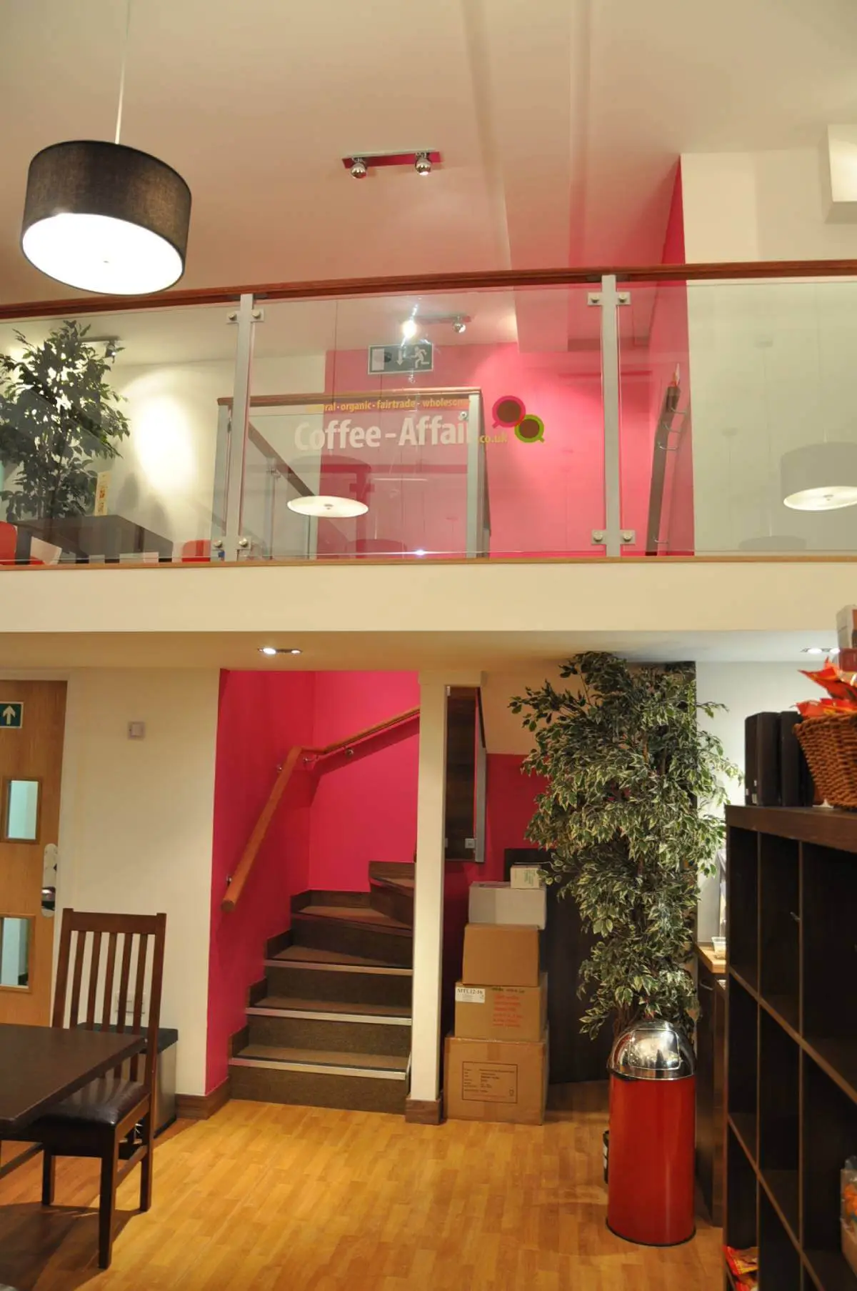 Vanilla Bazaar office space with designer furniture, laminated wood flooring, ceiling and glass partitions 7