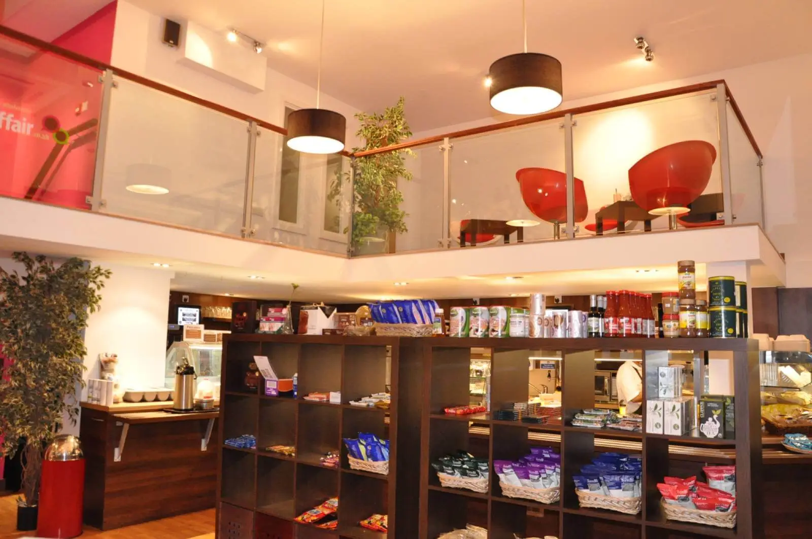 Vanilla Bazaar office space with designer furniture, laminated wood flooring, ceiling and glass partitions 9