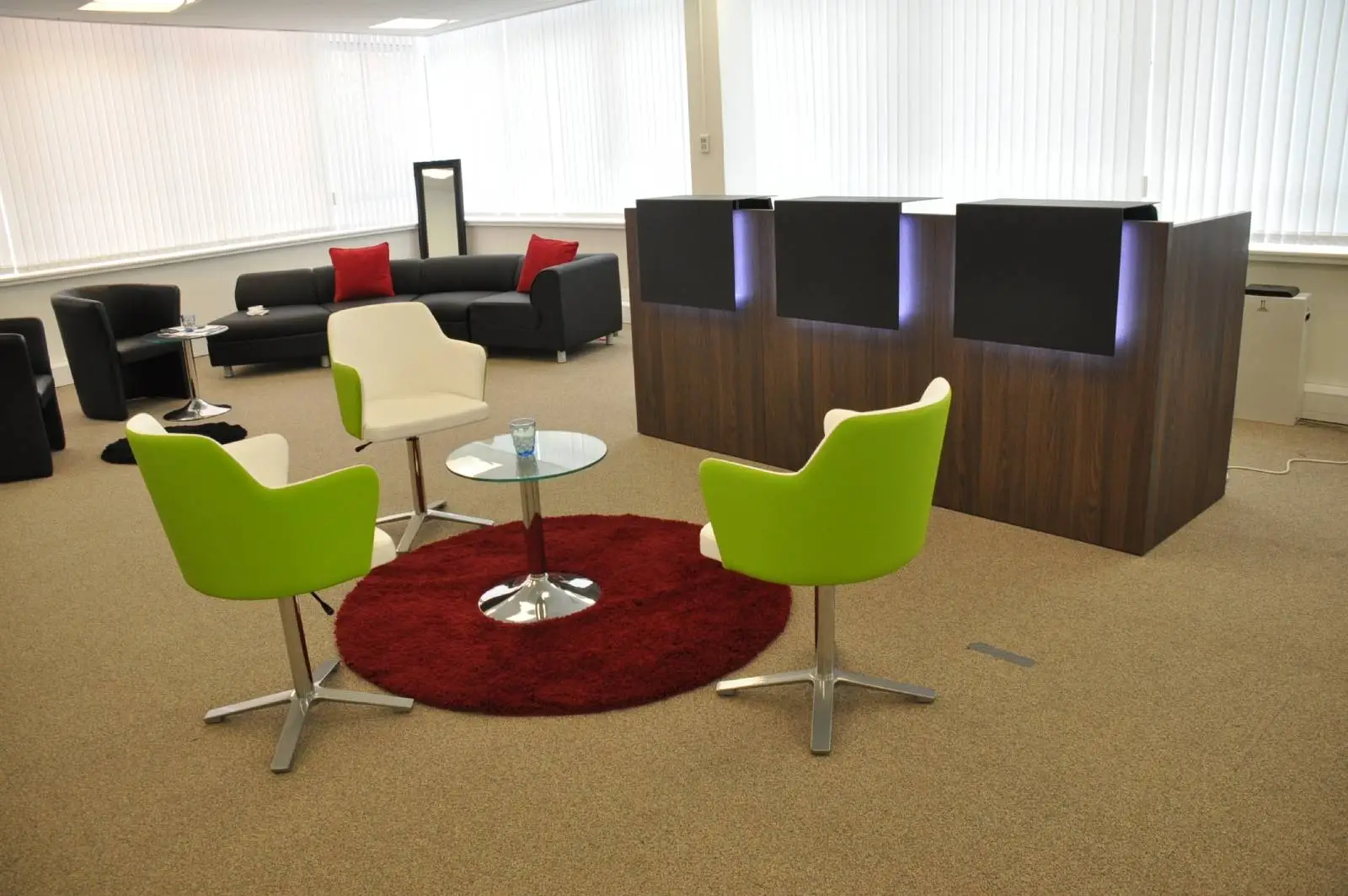 Corinthain House office space design with designer furniture, suspended grid ceiling, carpet tile flooring and glass partitions 12