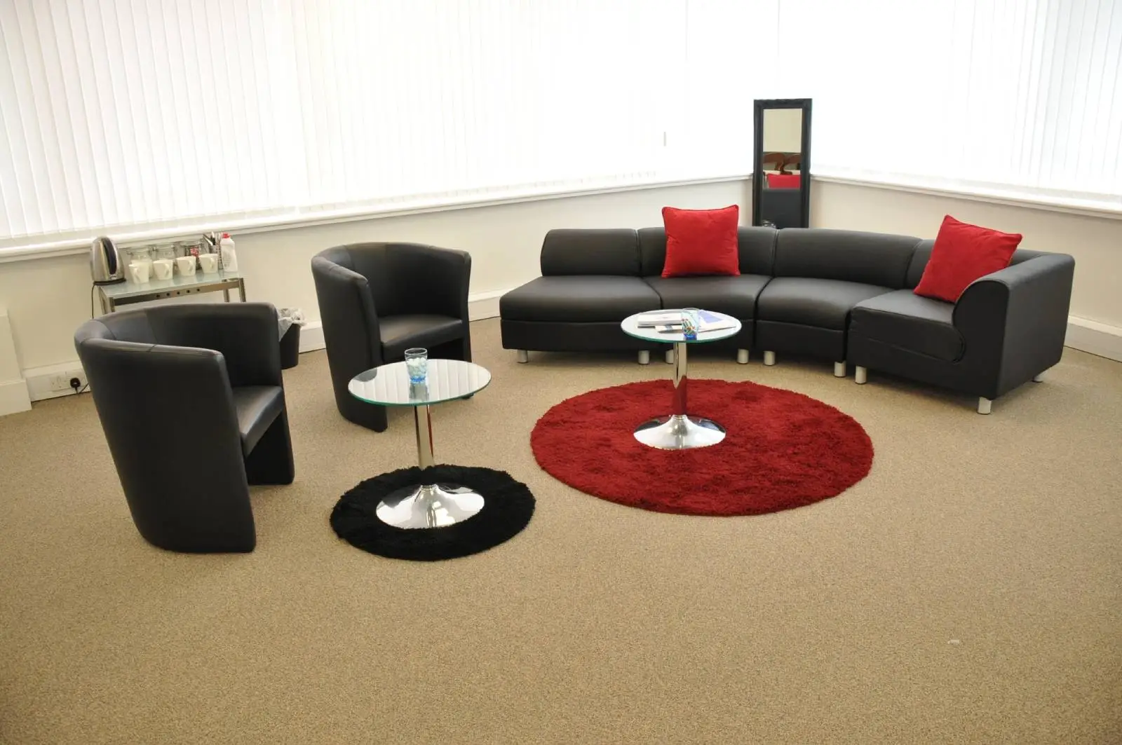 Corinthain House office space design with designer furniture, suspended grid ceiling, carpet tile flooring and glass partitions 3