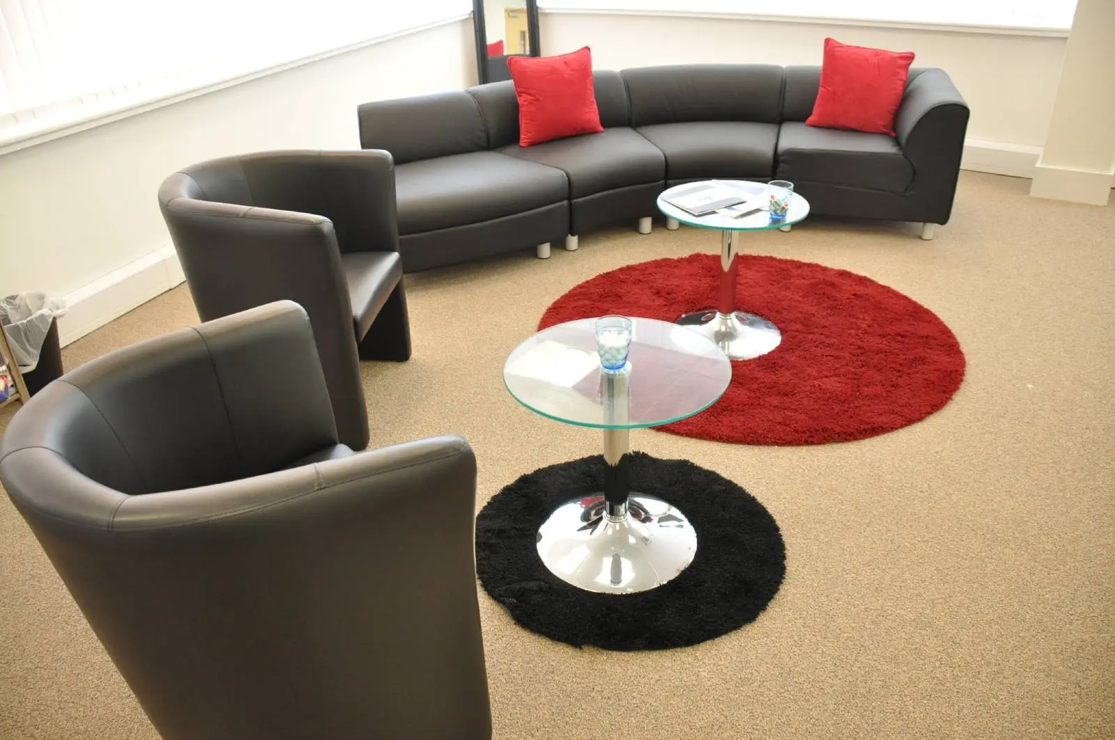 Corinthain House office space design with designer furniture, suspended grid ceiling, carpet tile flooring and glass partitions 5