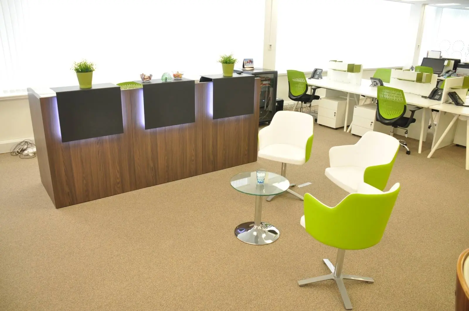 Corinthain House office space design with designer furniture, suspended grid ceiling, carpet tile flooring and glass partitions 8