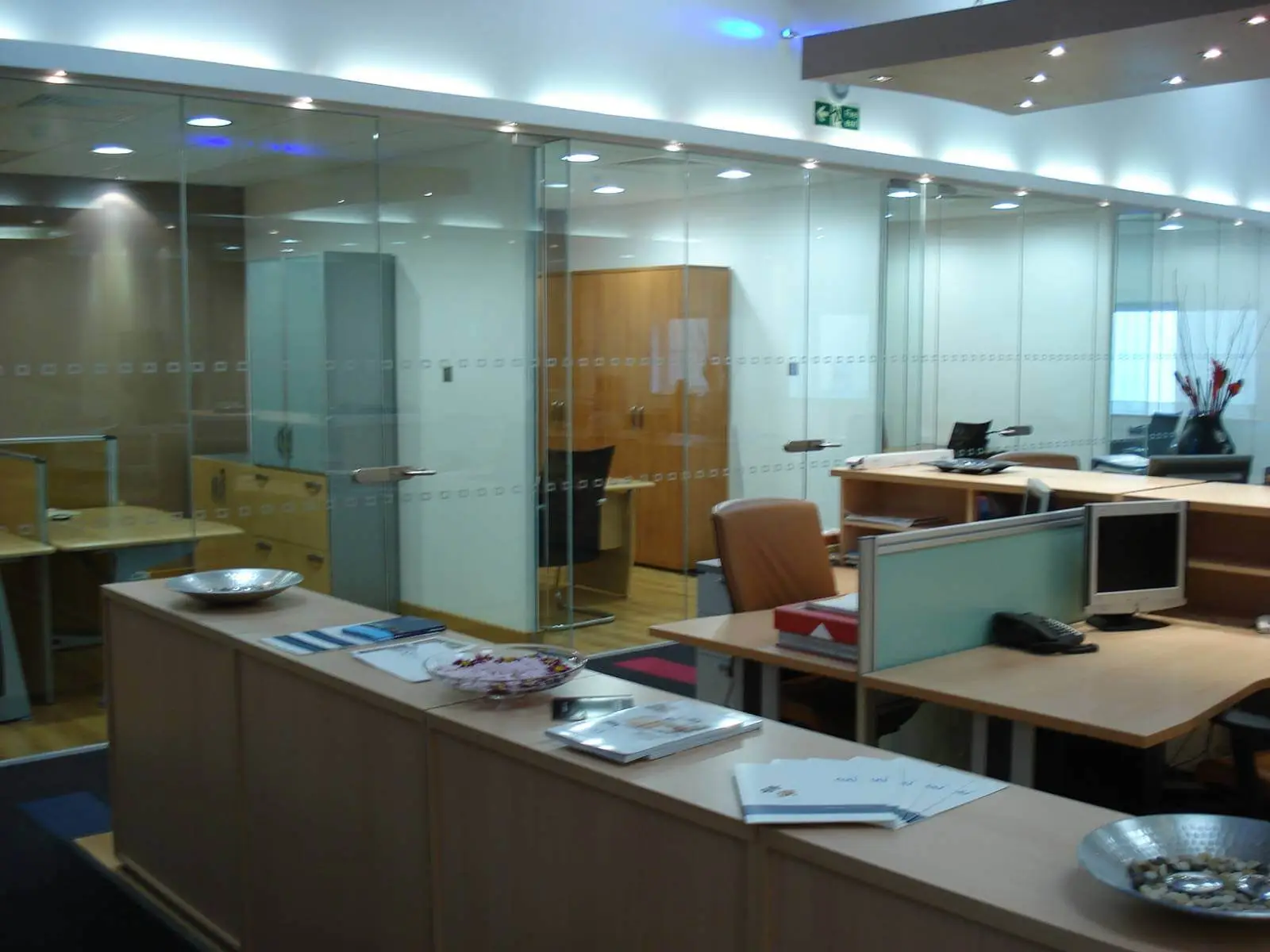 GXI office unit D space design with designer furniture, along with flooring, ceiling, and glass partitions 15