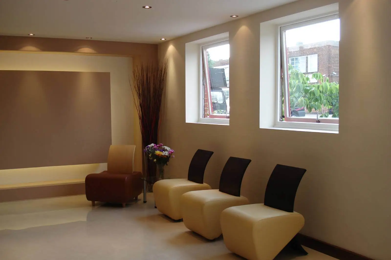 GXI office unit D space design with designer furniture, along with flooring, ceiling, and glass partitions 2