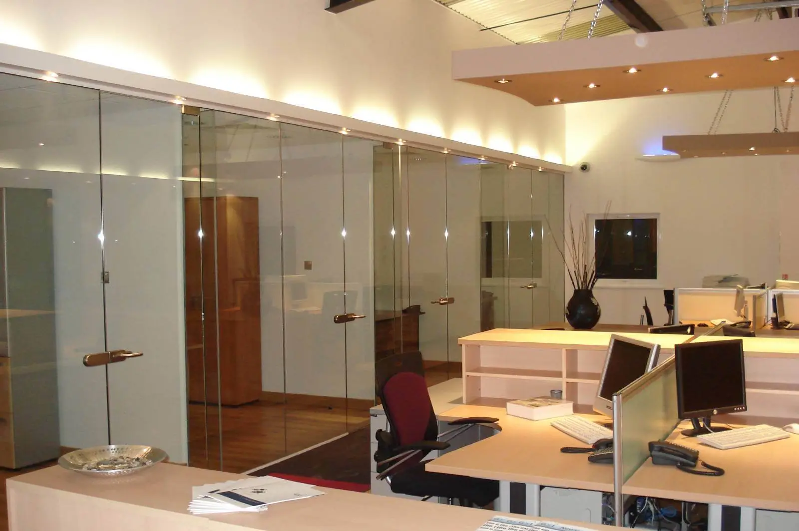 GXI office unit D space design with designer furniture, along with flooring, ceiling, and glass partitions 4