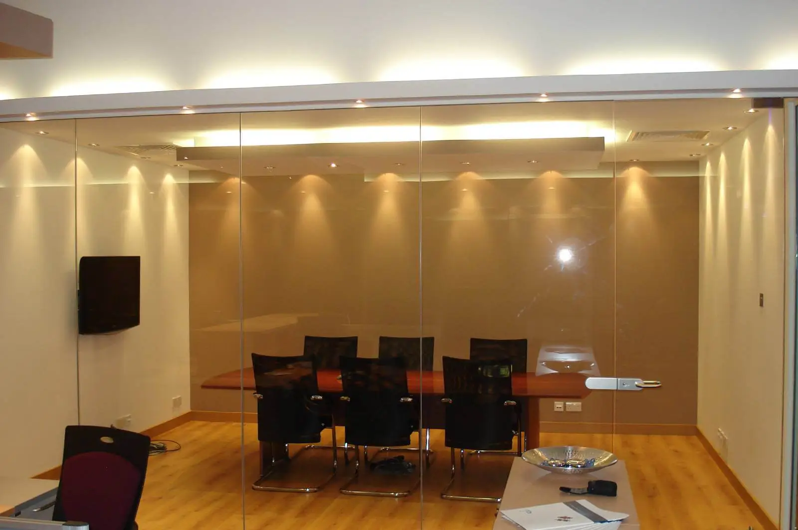 GXI office unit D space design with designer furniture, along with flooring, ceiling, and glass partitions 5