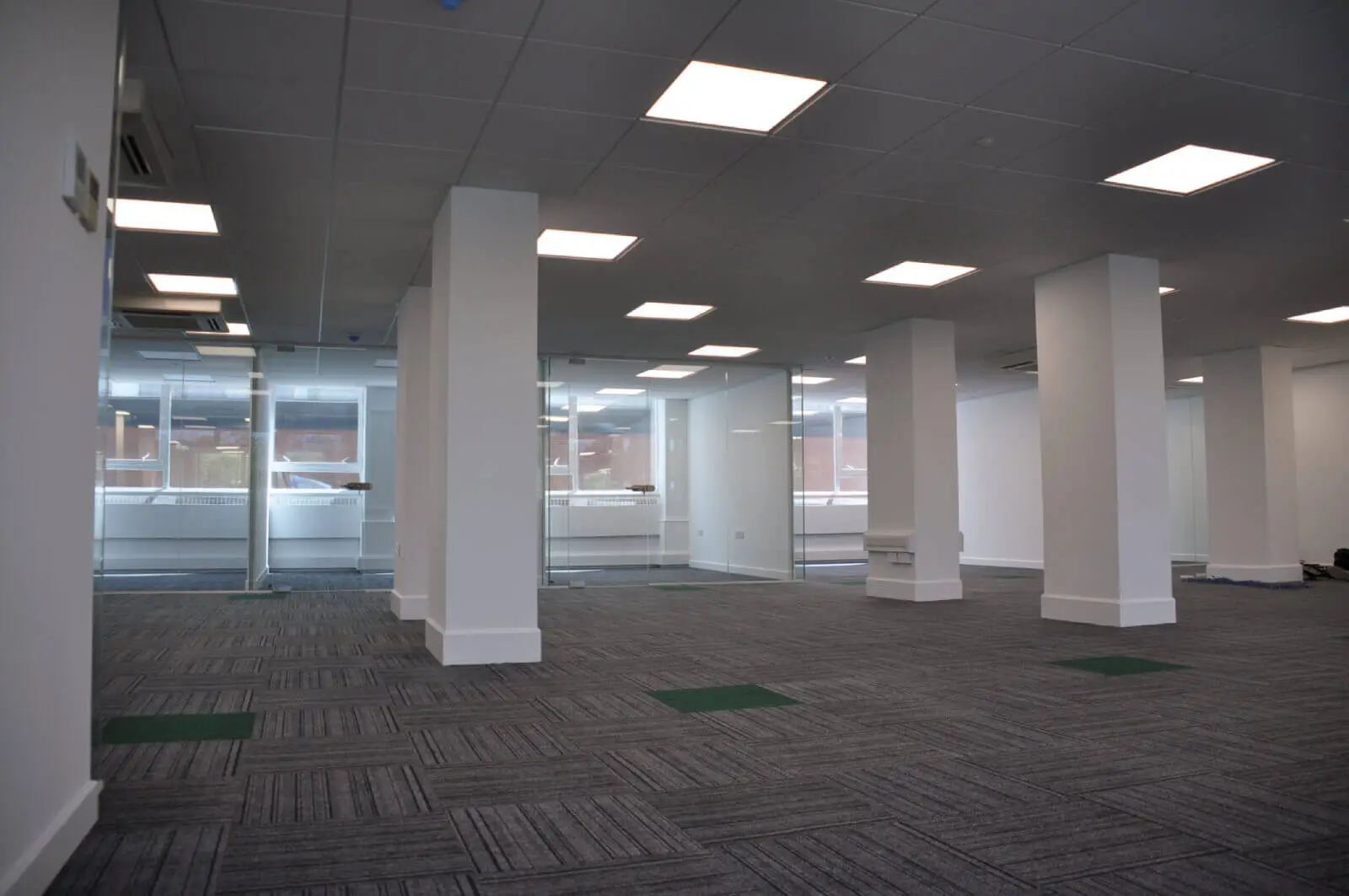 landau morely office design and refurbishment with single glazed glass partitions and furniture 23