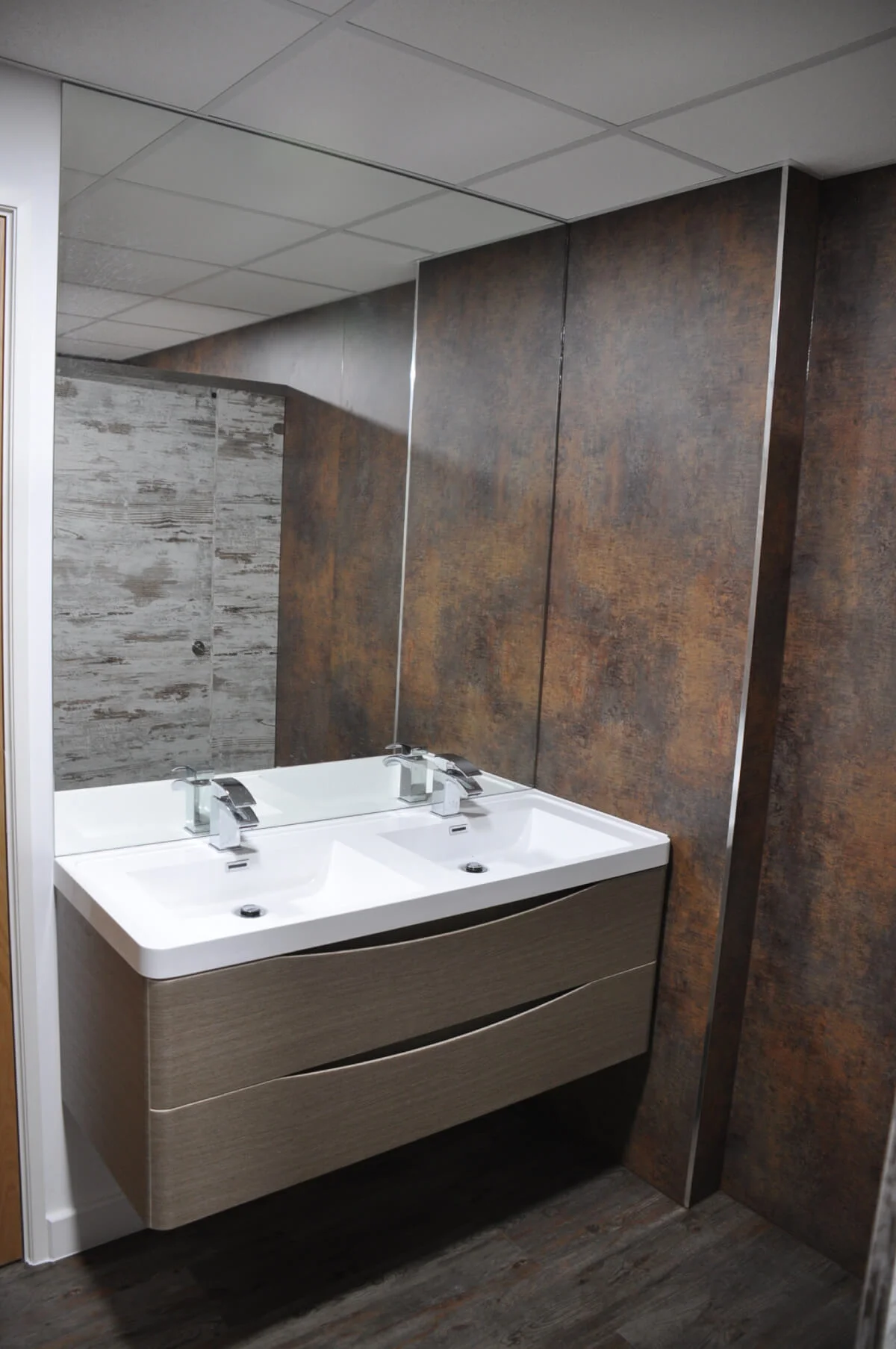 Nasco office space with designer flooring and single glazed solid stud wall glass partitions 27