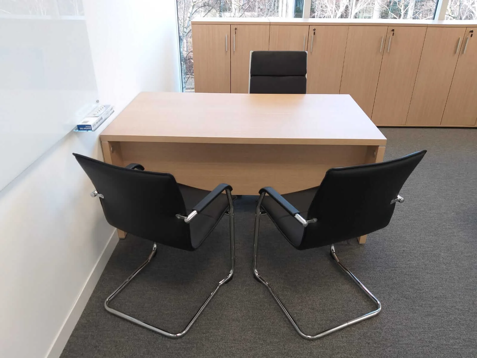 Oppo office space with designer single and back to back desks chairs and glass partitions 14