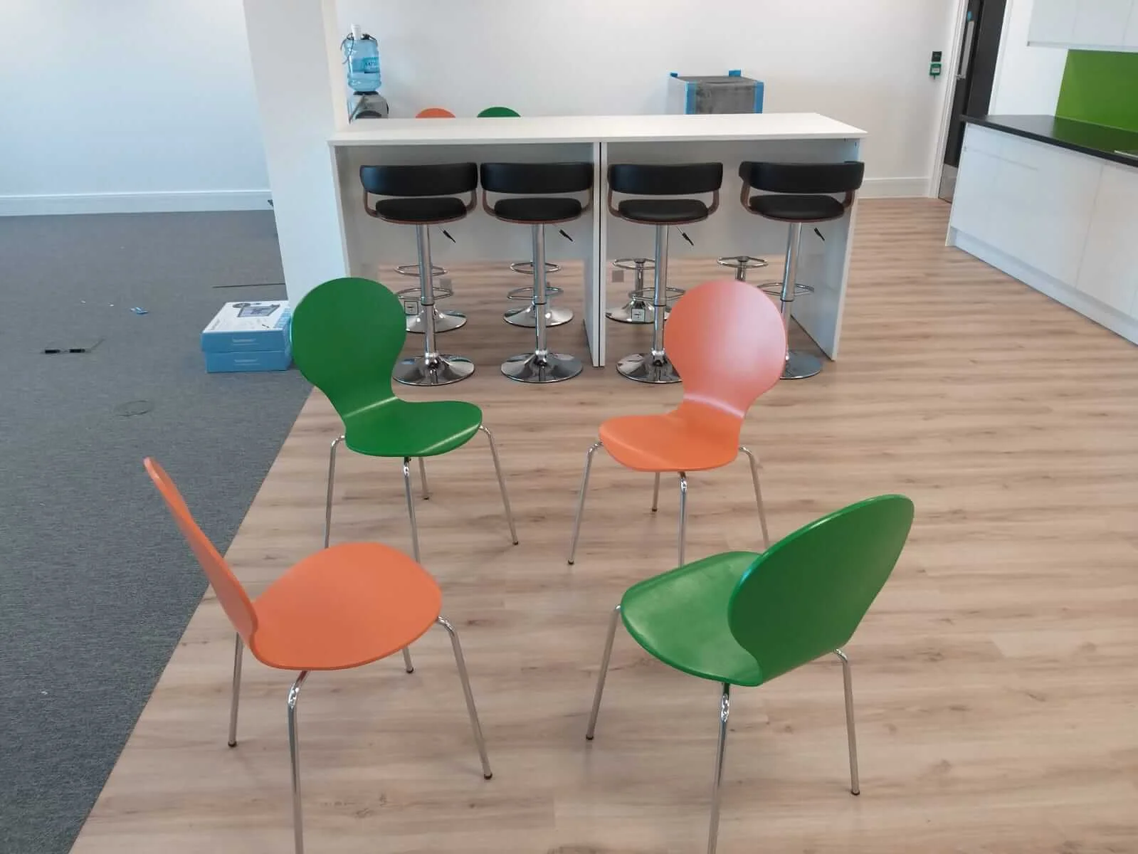 Oppo office space with designer single and back to back desks chairs and glass partitions 16