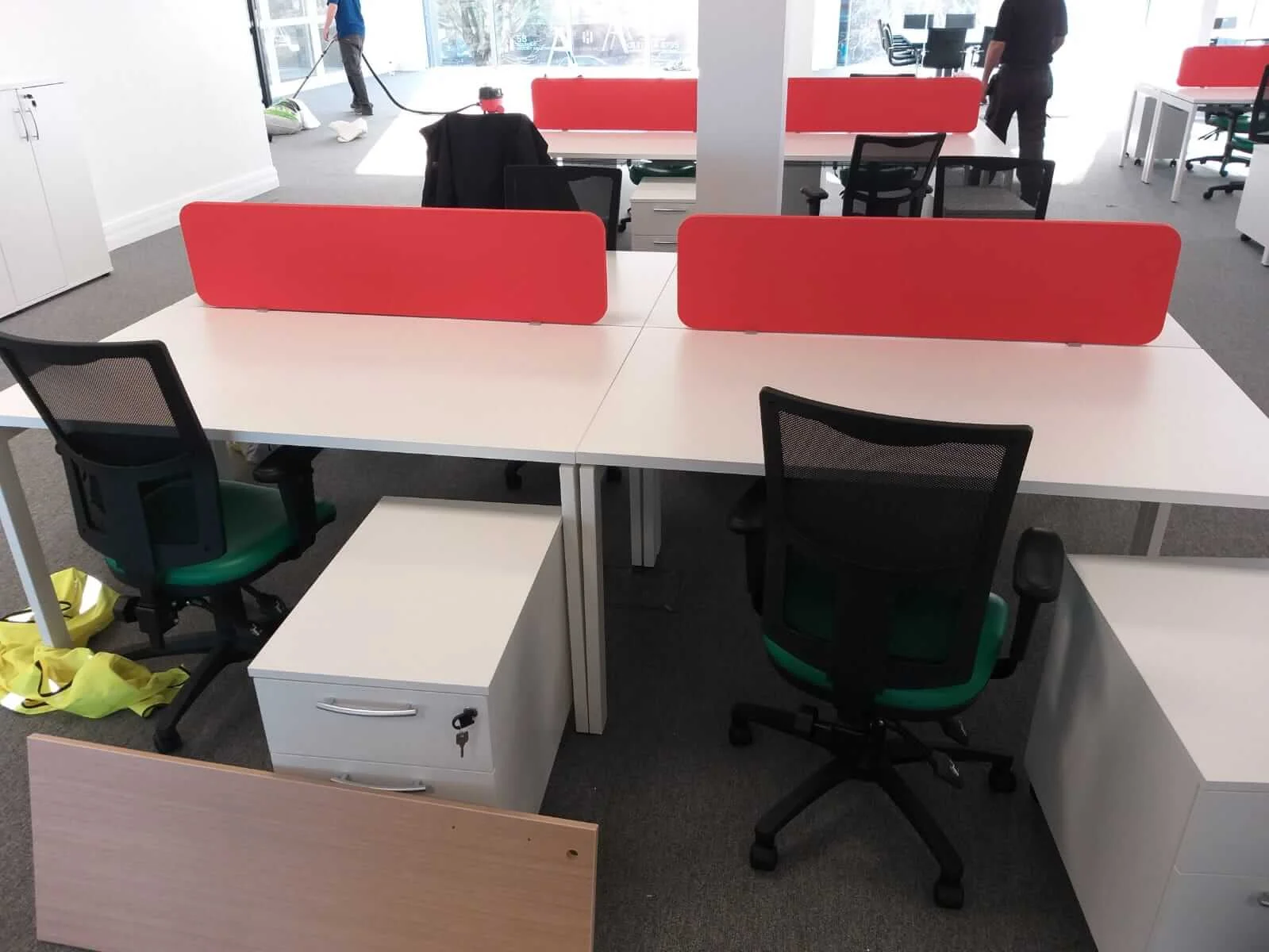 Oppo office space with designer single and back to back desks chairs and glass partitions 18
