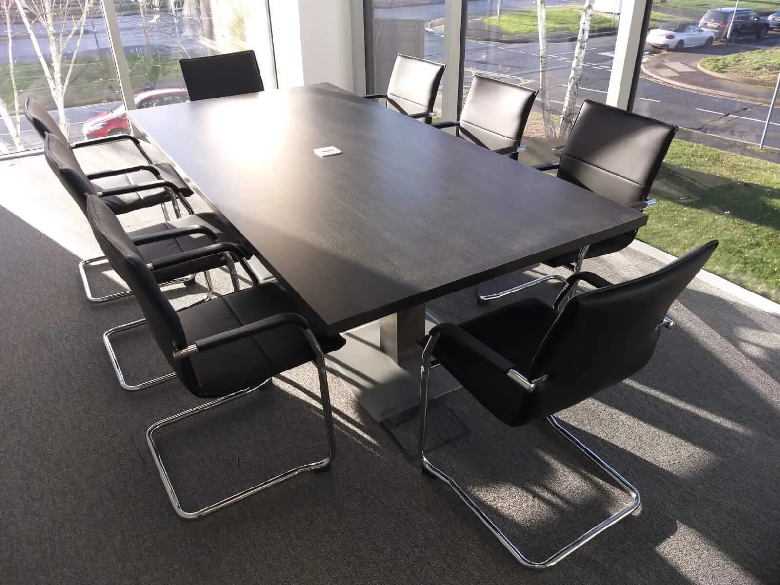 Oppo office space with designer single and back to back desks chairs and glass partitions 20