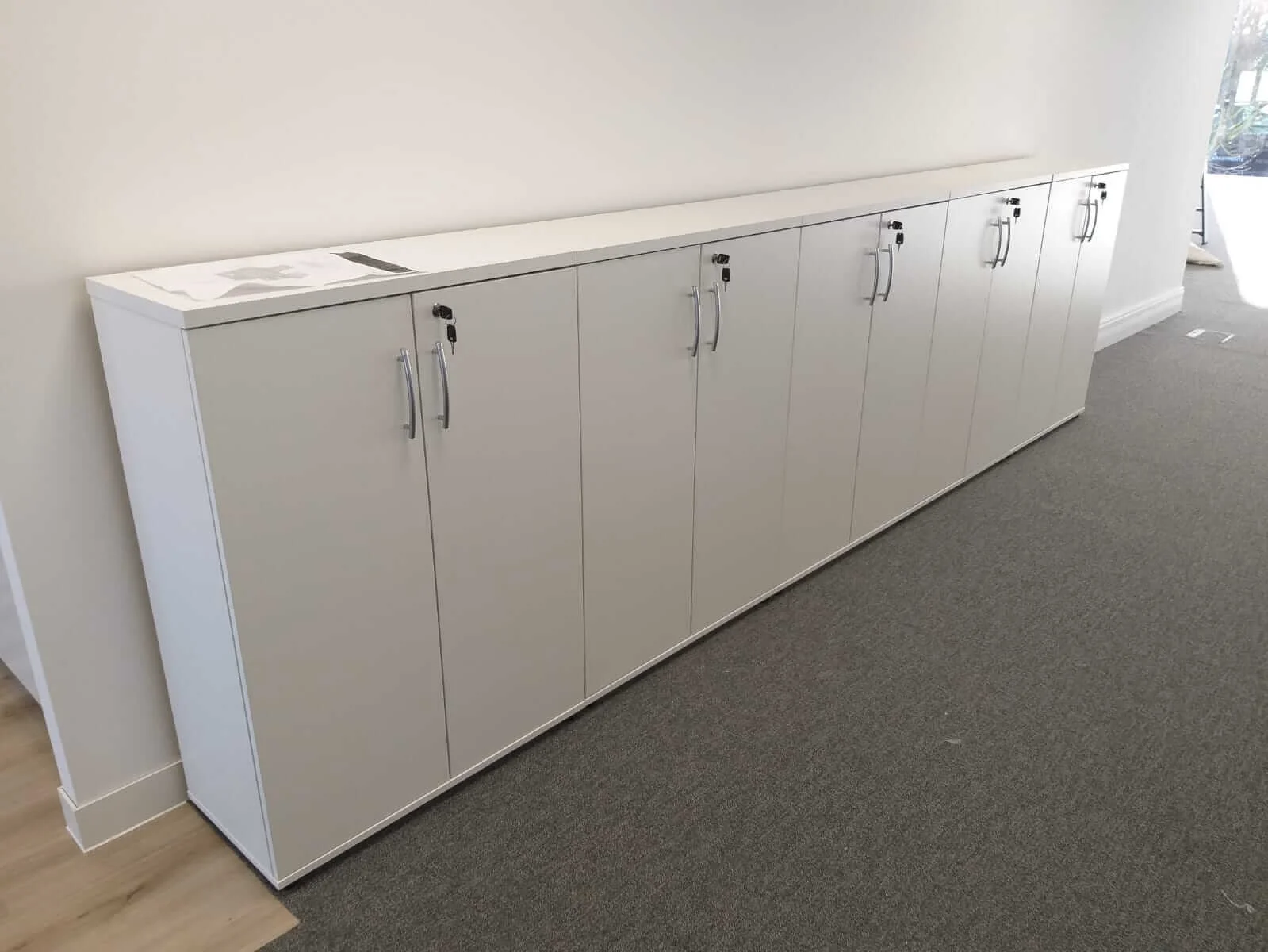 Oppo office space with designer single and back to back desks chairs and glass partitions 7