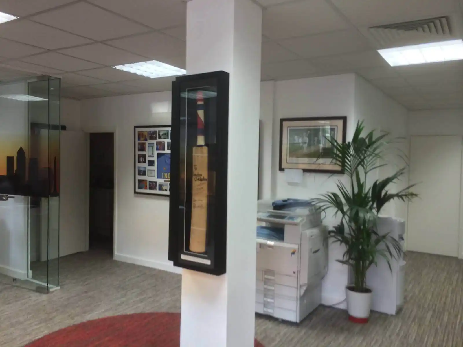 Prideview developers office space with designer furnitures and carpet tile flooring and suspended grid ceiling and frameless glass partitions screen 14