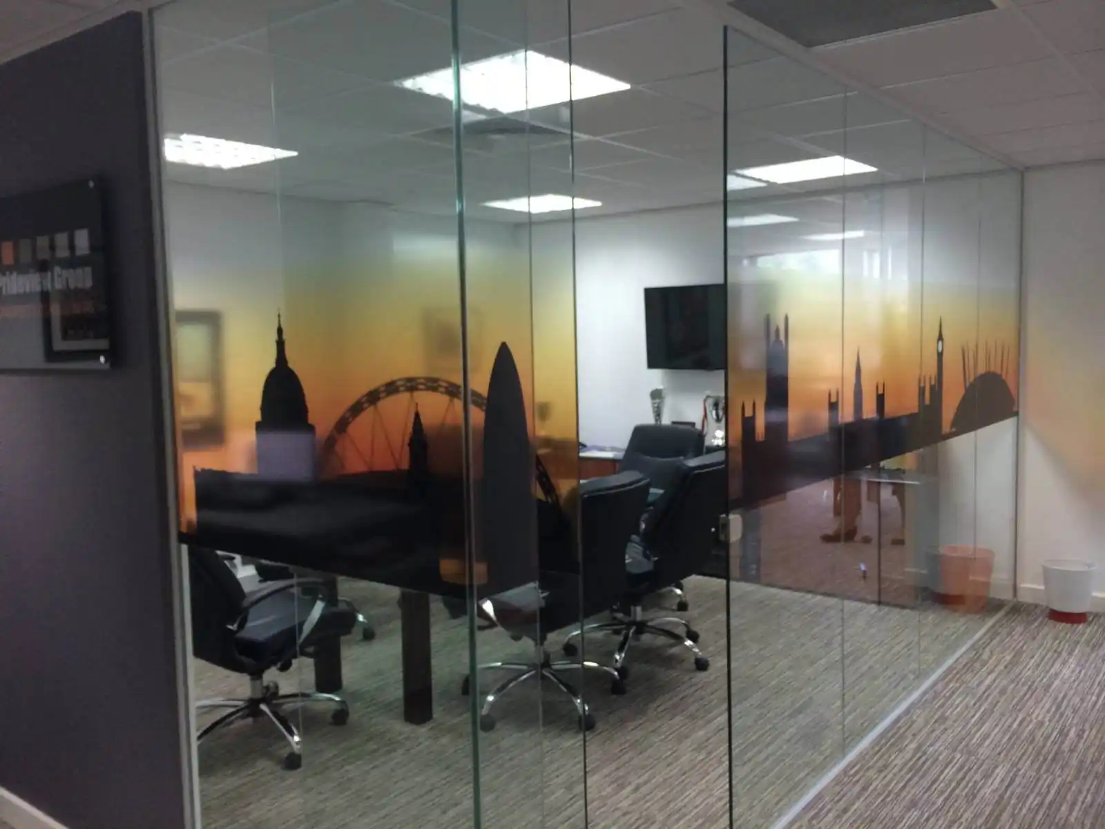 Prideview developers office space with designer furnitures and carpet tile flooring and suspended grid ceiling and frameless glass partitions screen 4