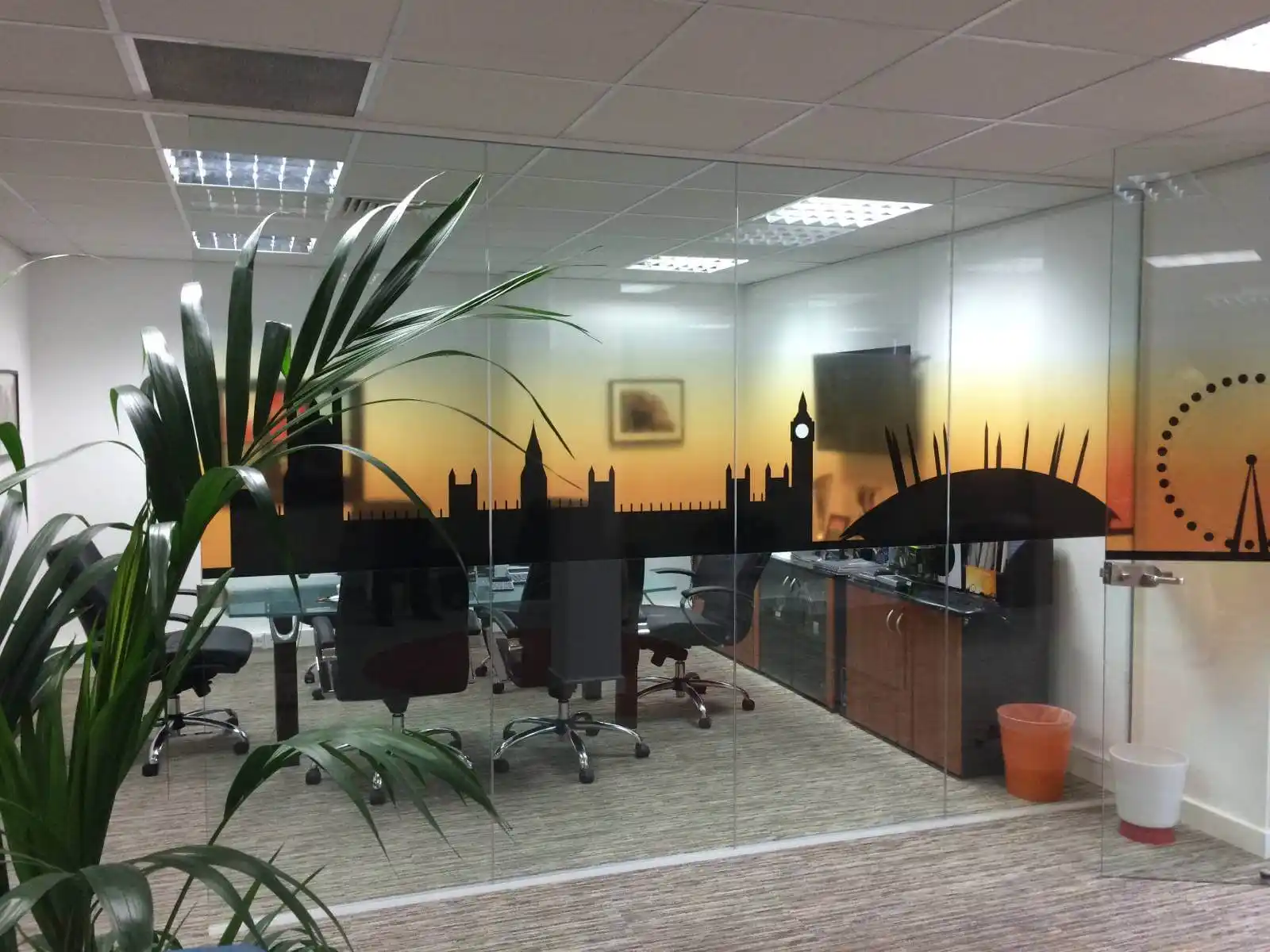 Prideview developers office space with designer furnitures and carpet tile flooring and suspended grid ceiling and frameless glass partitions screen 5