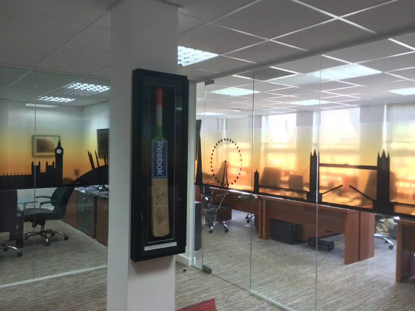 Prideview developers office space with designer furnitures and carpet tile flooring and suspended grid ceiling and frameless glass partitions screen 8