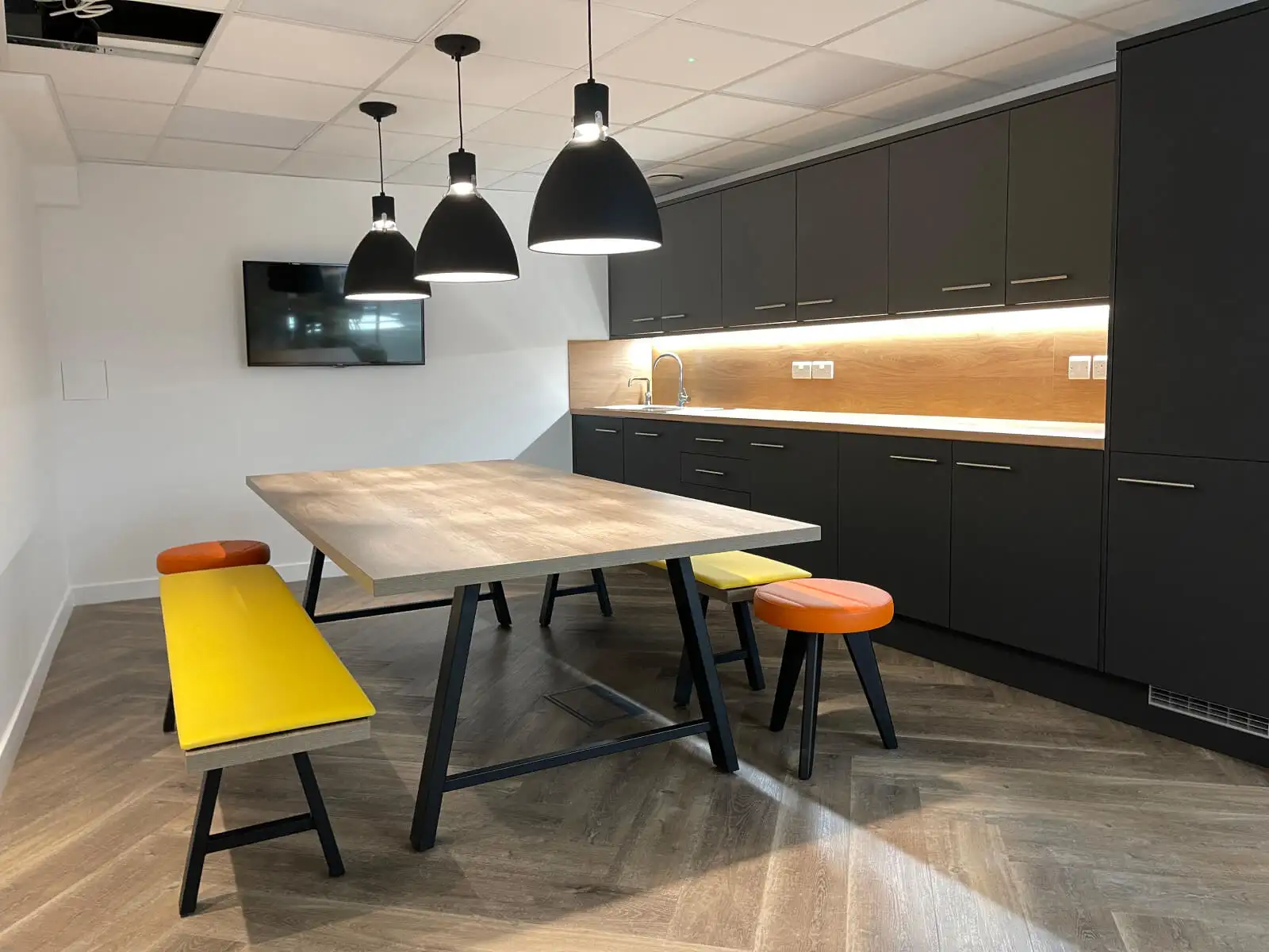 Prideview Properties office space with designer furnitures and black framed glass partitions 17