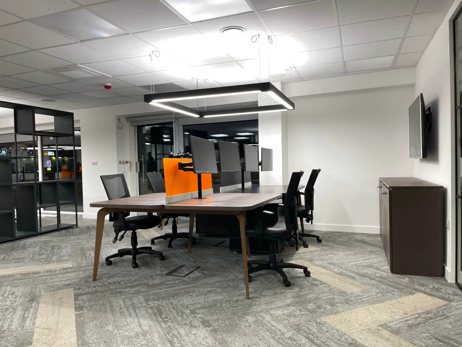 Prideview Properties office space with designer furnitures and black framed glass partitions 19