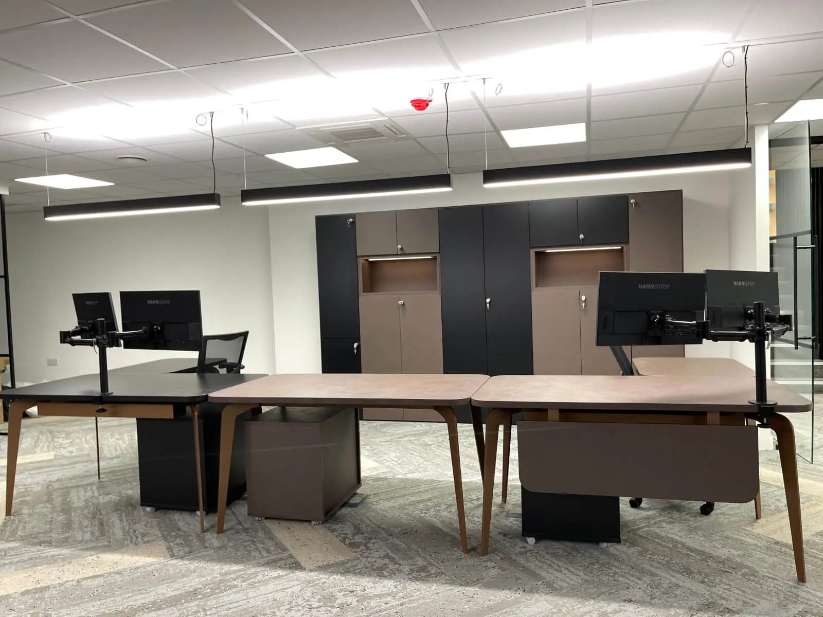 Prideview Properties office space with designer furnitures and black framed glass partitions 21