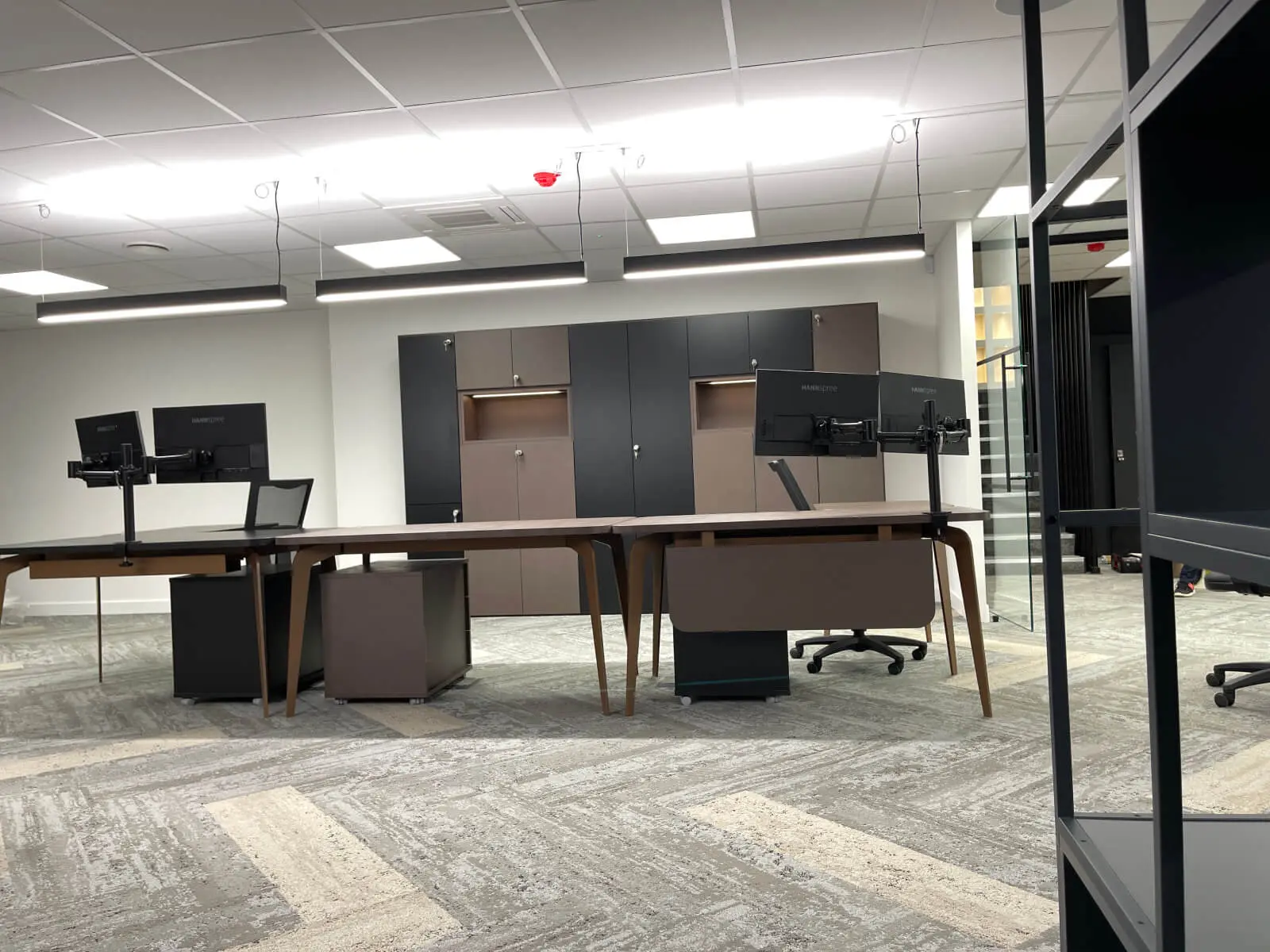 Prideview Properties office space with designer furnitures and black framed glass partitions 22