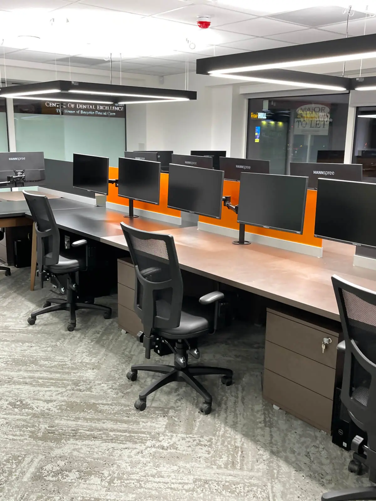 Prideview Properties office space with designer furnitures and black framed glass partitions 23