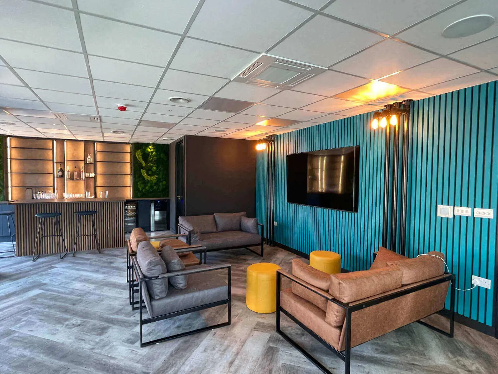 Prideview Properties office space with designer furnitures and black framed glass partitions 24