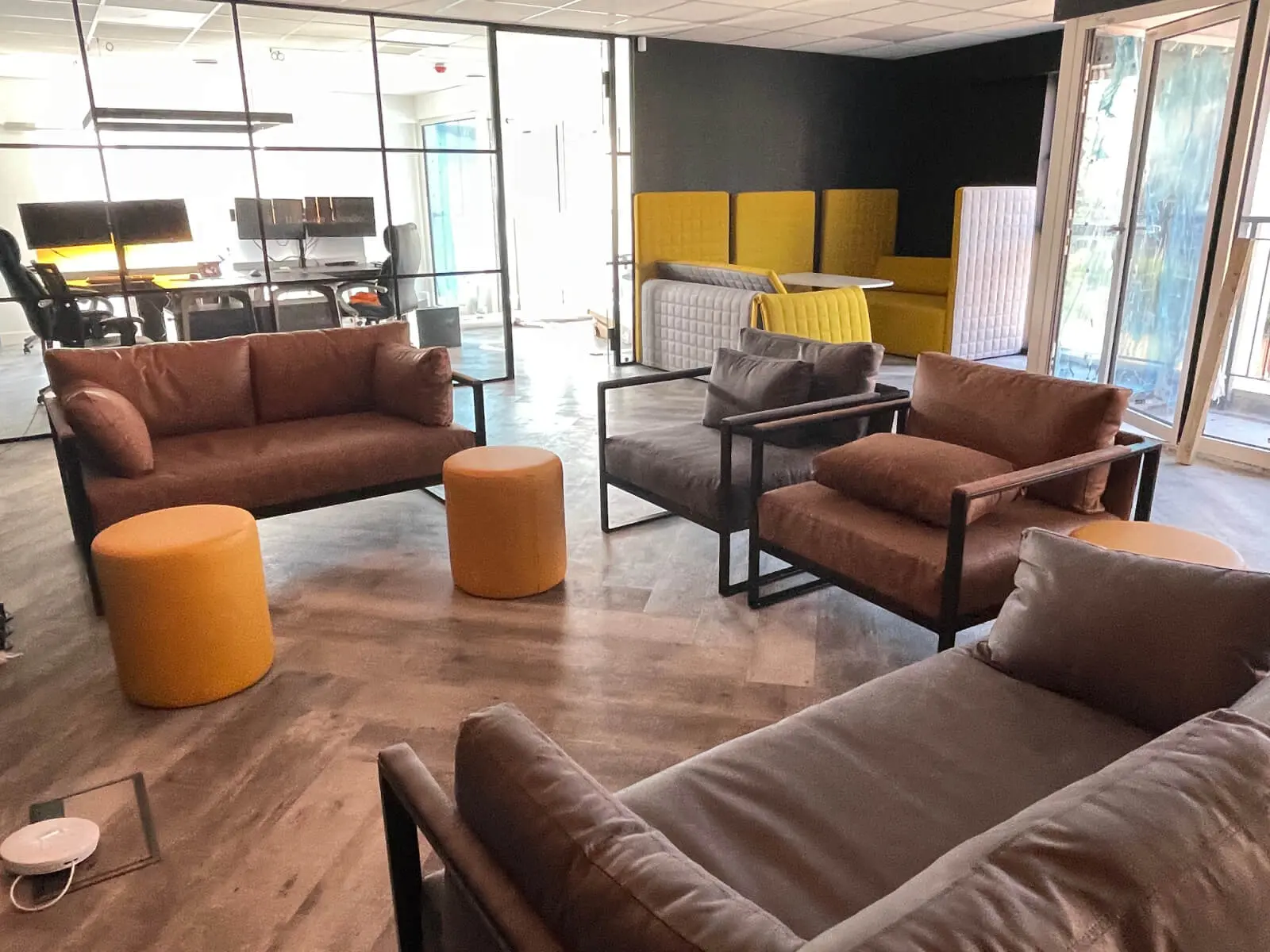 Prideview Properties office space with designer furnitures and black framed glass partitions 29