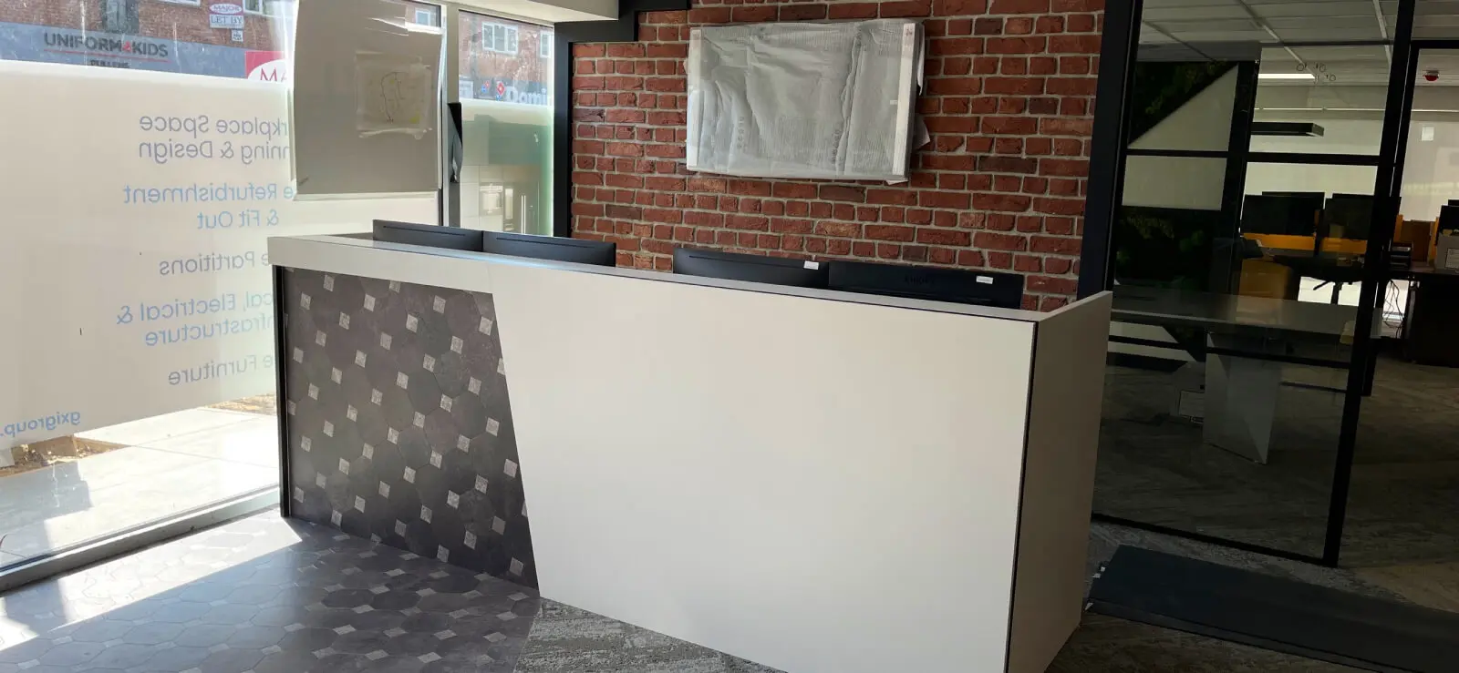 Prideview Properties office space with designer furnitures and black framed glass partitions 37
