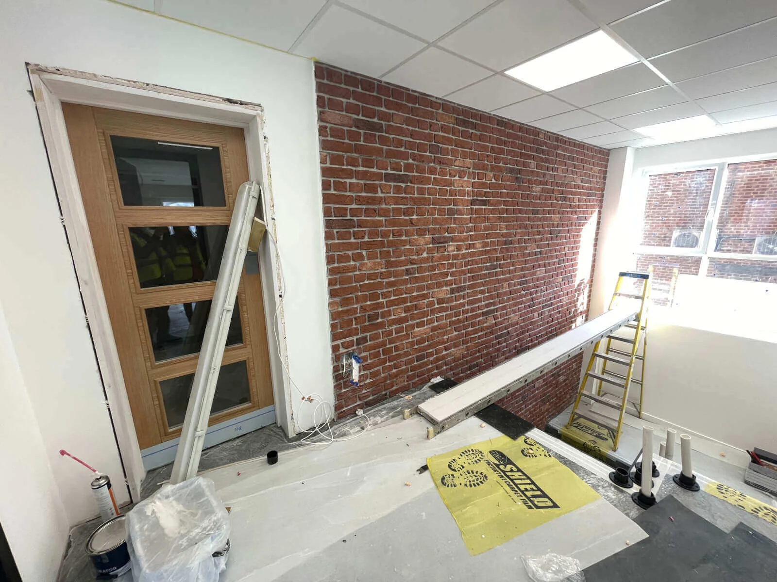 Prideview Properties office space with designer furnitures and black framed glass partitions 41