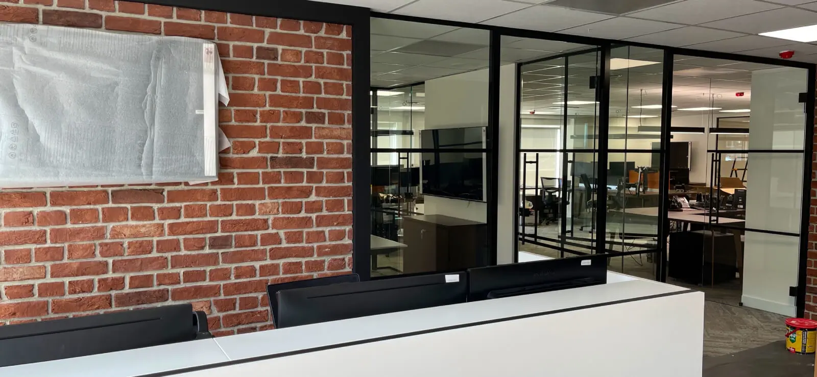 Prideview Properties office space with designer furnitures and black framed glass partitions 50