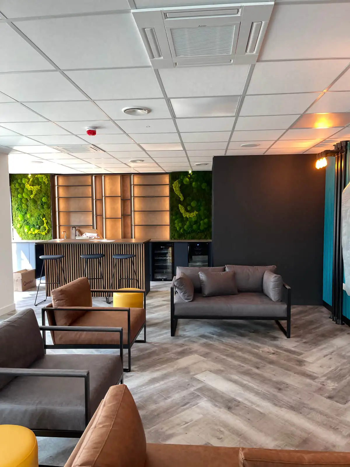 Prideview Properties office space with designer furnitures and black framed glass partitions 51