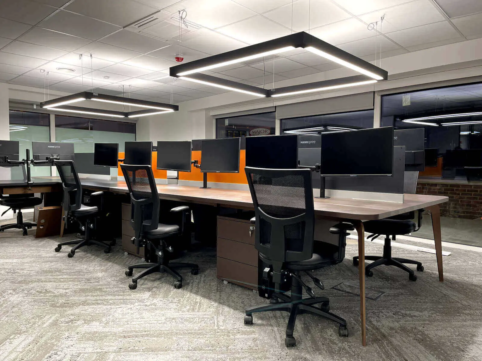 Prideview Properties office space with designer furnitures and black framed glass partitions 67