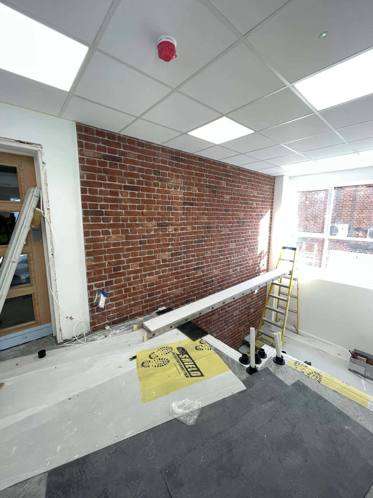Prideview Properties office space with designer furnitures and black framed glass partitions 76