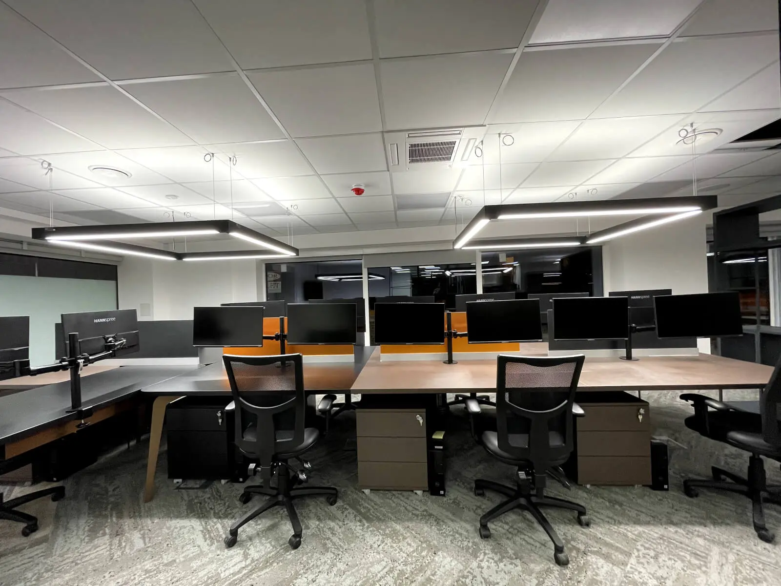 Prideview Properties office space with designer furnitures and black framed glass partitions 70