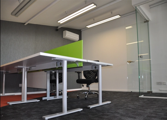 Simon Wang office space with designer furniture, flooring, suspended grid celing and glass partitions 9