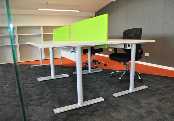 Simon Wang office space with designer furniture, flooring, suspended grid celing and glass partitions 7