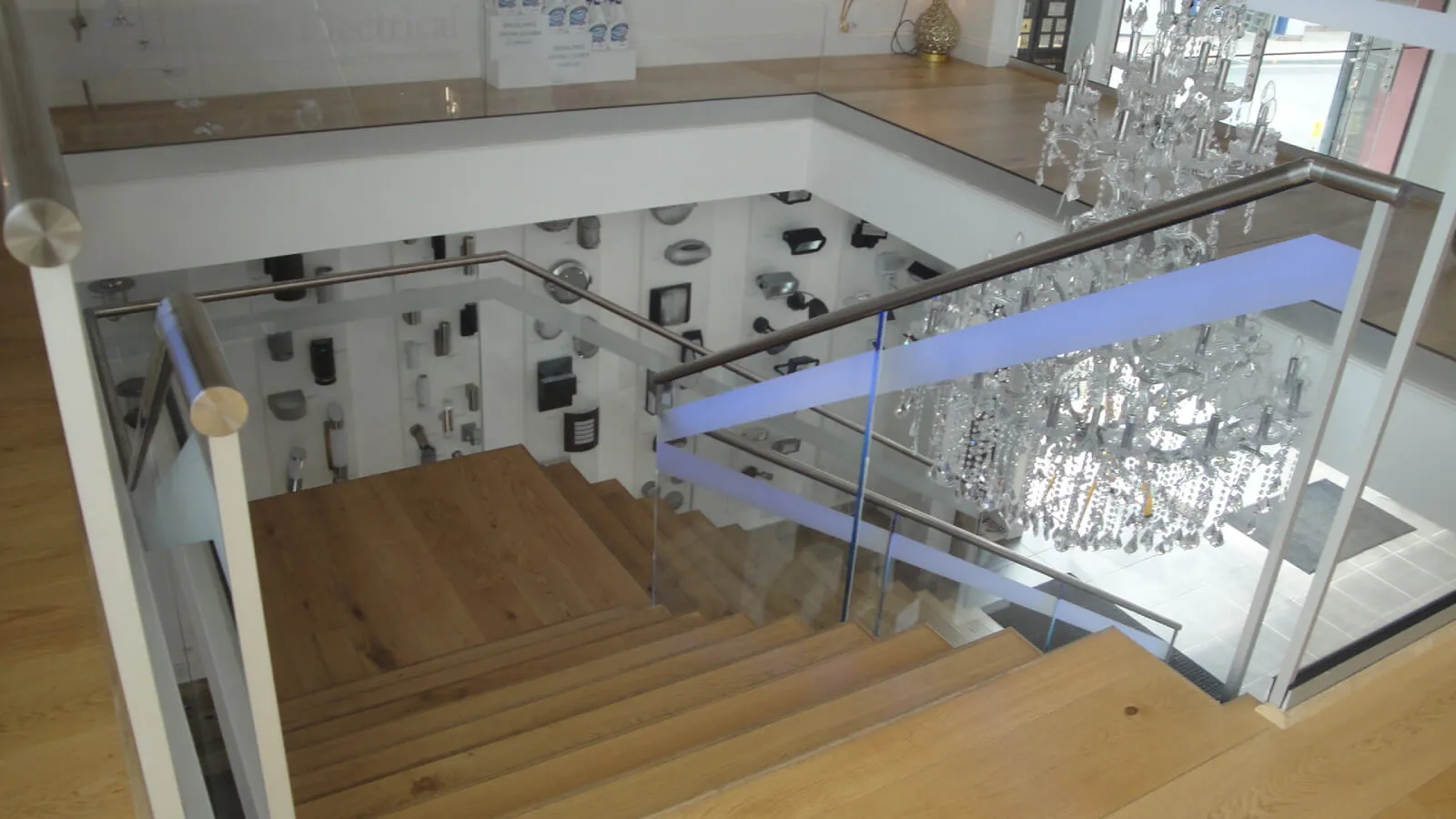 Tansales office with single glazed with frameless doors glass partitions and desinger furniture 30