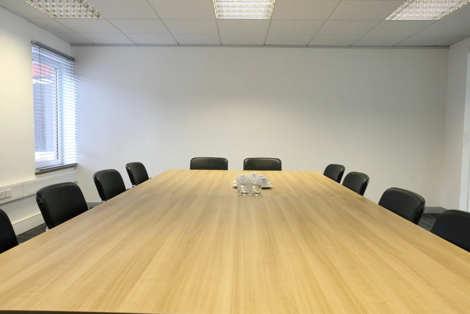 Tempus Court office with single glazed with frameless doors glass partitions and desinger furniture 2