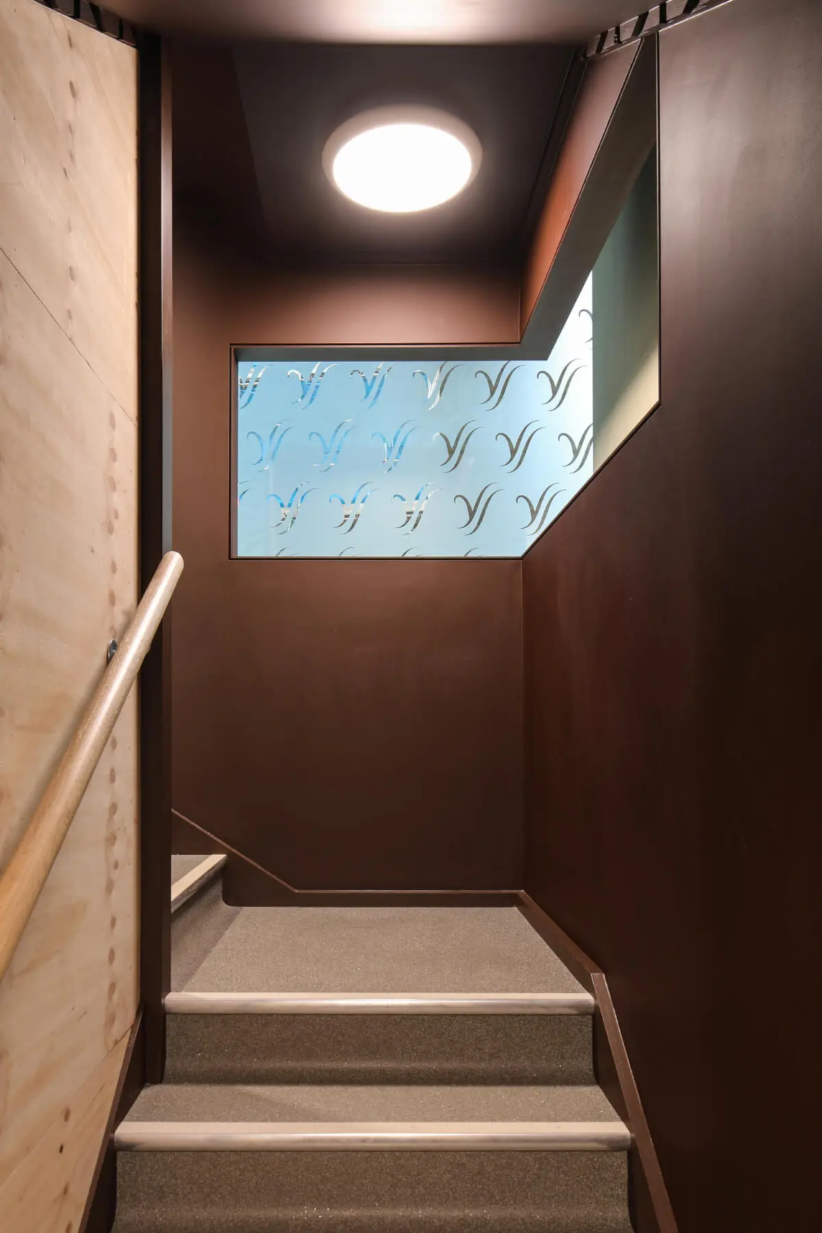 Vanilla Bazaar office space with designer furniture, laminated wood flooring, ceiling and glass partitions 11