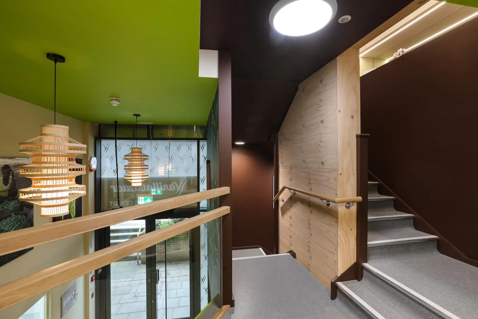 Vanilla Bazaar office space with designer furniture, laminated wood flooring, ceiling and glass partitions 14