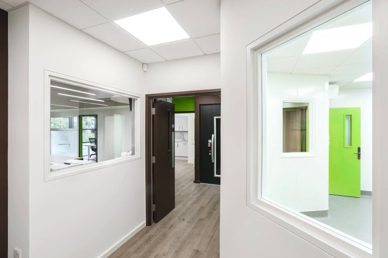 Vanilla Bazaar office space with designer furniture, laminated wood flooring, ceiling and glass partitions 16